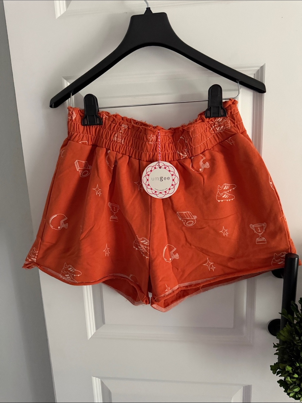 Umgee Orange Athletic Paperbag Waist Shorts with White football Prints medium